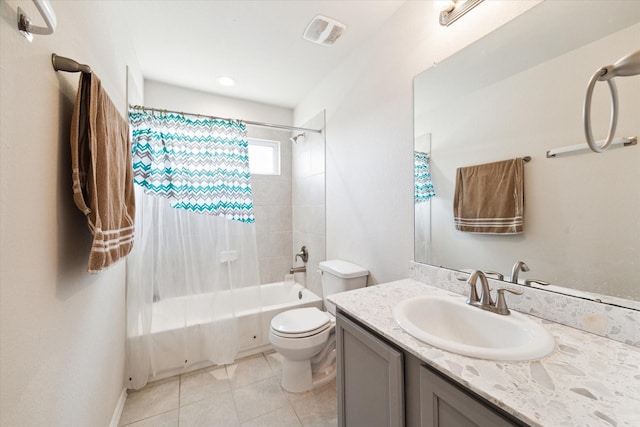 full bathroom with tile patterned floors, shower / tub combo with curtain, vanity, and toilet