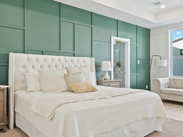 bedroom featuring hardwood / wood-style flooring