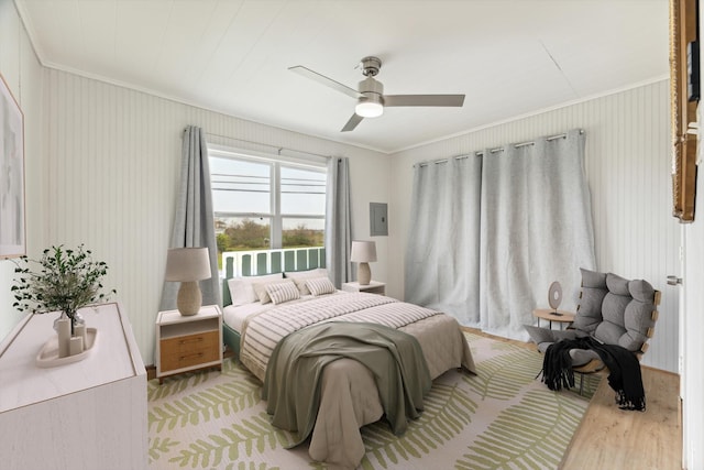 bedroom featuring ceiling fan and ornamental molding