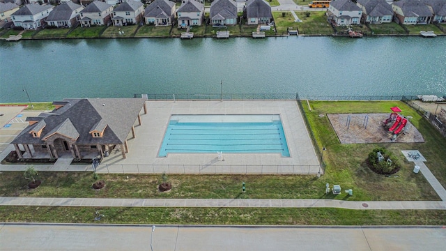 birds eye view of property featuring a water view