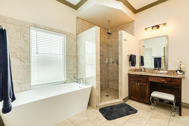 bathroom with vanity, ornamental molding, and independent shower and bath