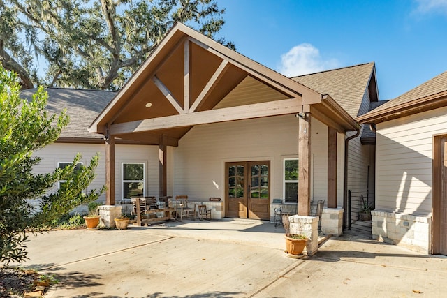 back of house featuring french doors and a patio area