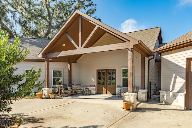 14 Augusta Ln, West Columbia, TX 77486 - back of house with a patio, roof with shingles, and french doors