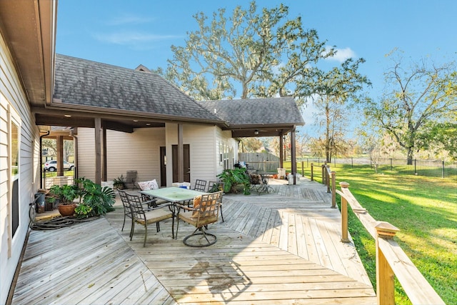 14 Augusta Ln, West Columbia, TX 77486 - wooden terrace featuring outdoor dining area and a fenced backyard