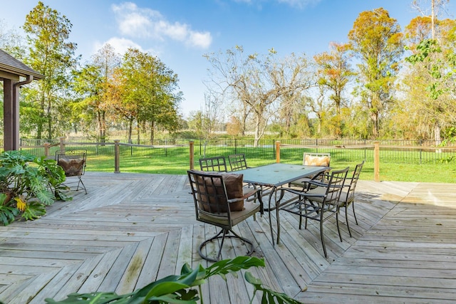 14 Augusta Ln, West Columbia, TX 77486 - wooden deck featuring outdoor dining space and a fenced backyard