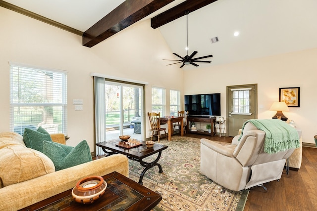 living room with beam ceiling, ceiling fan, hardwood / wood-style floors, and high vaulted ceiling