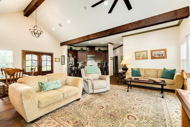 living room featuring high vaulted ceiling, french doors, ceiling fan with notable chandelier, beam ceiling, and wood-type flooring