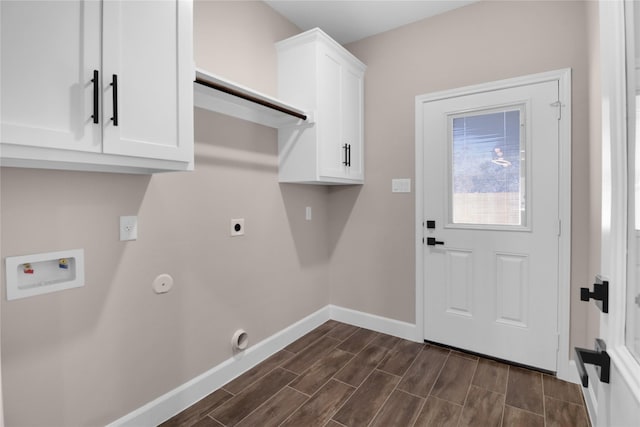 laundry area with cabinets, hookup for a washing machine, electric dryer hookup, dark hardwood / wood-style floors, and hookup for a gas dryer