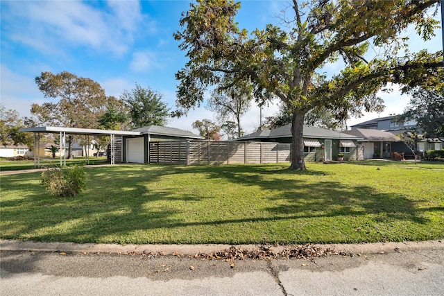 view of yard with a carport