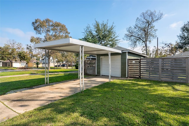 exterior space with a yard and a garage