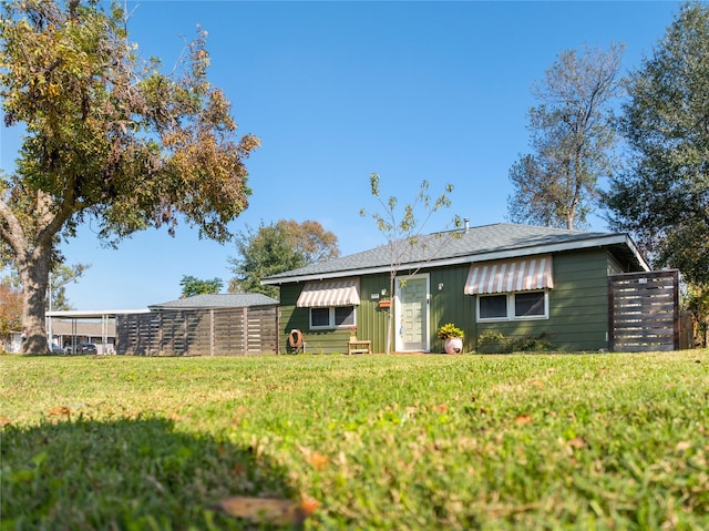 view of front of house with a front lawn