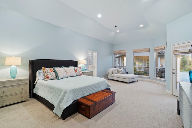 bedroom featuring access to exterior, vaulted ceiling, and light colored carpet