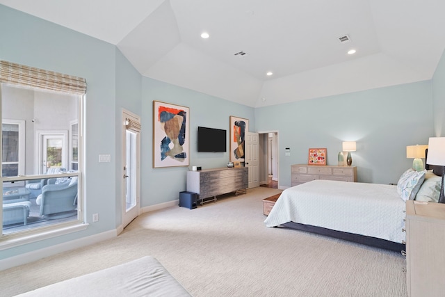 carpeted bedroom featuring high vaulted ceiling