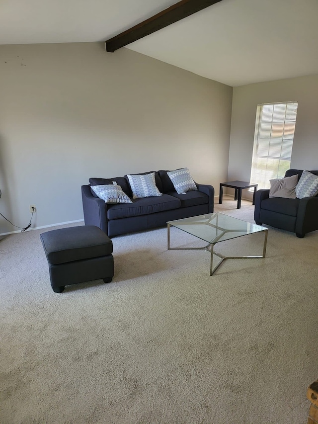 living room with carpet and lofted ceiling with beams