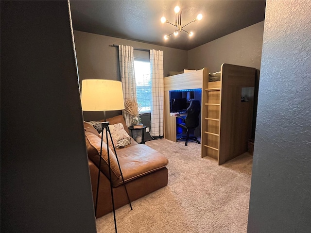 bedroom with carpet flooring and an inviting chandelier