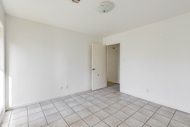 view of tiled empty room