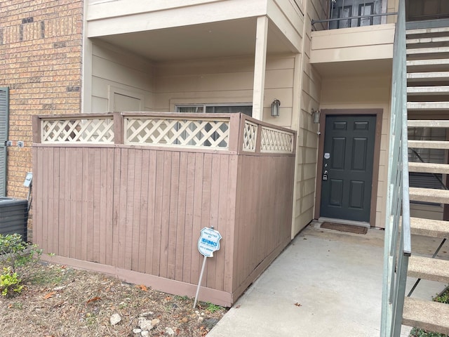 entrance to property with a balcony