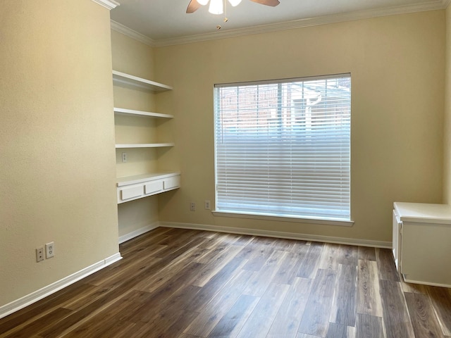 interior space with dark hardwood / wood-style flooring, ceiling fan, and crown molding