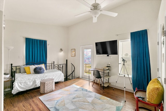 bedroom featuring wood-type flooring, ceiling fan, and lofted ceiling