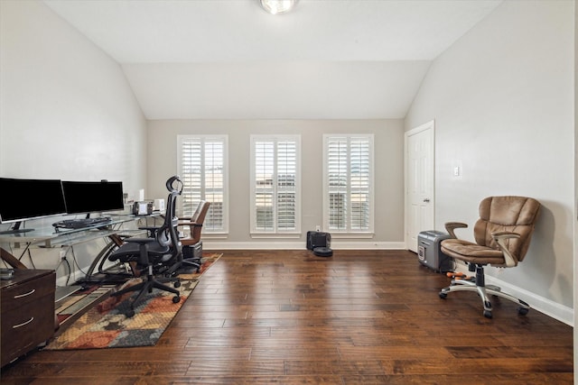 office space featuring vaulted ceiling and dark hardwood / wood-style floors