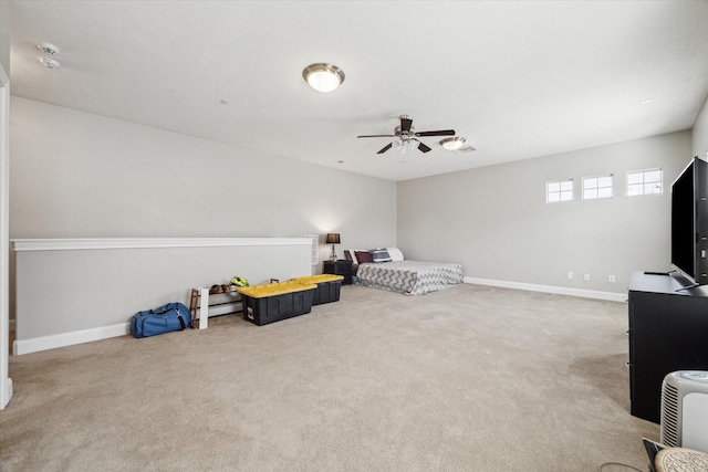 bedroom featuring light carpet and ceiling fan