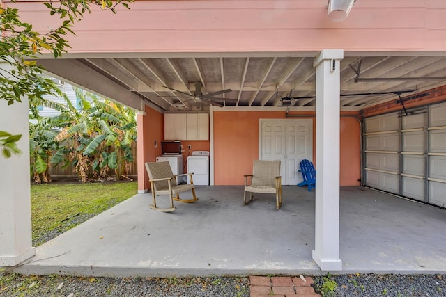 view of patio / terrace with independent washer and dryer and ceiling fan