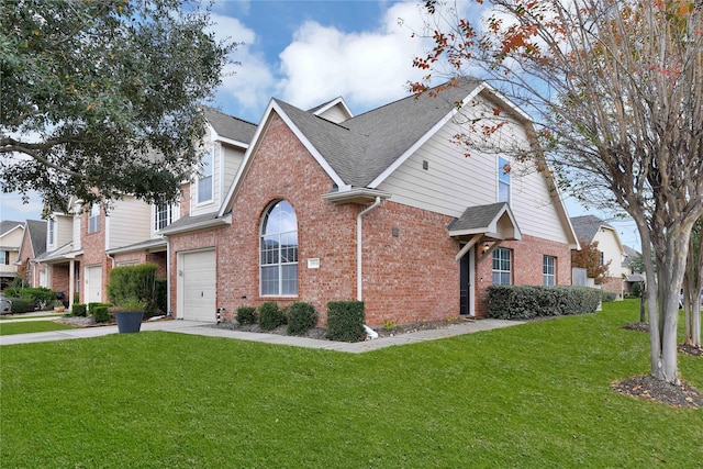 view of side of property with a yard and a garage