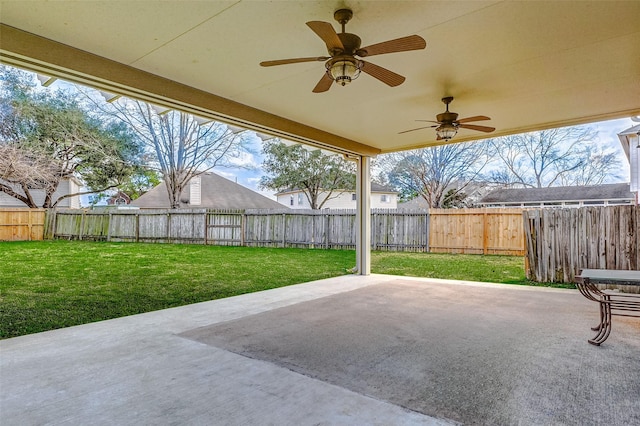 view of patio / terrace with a fenced backyard and a ceiling fan