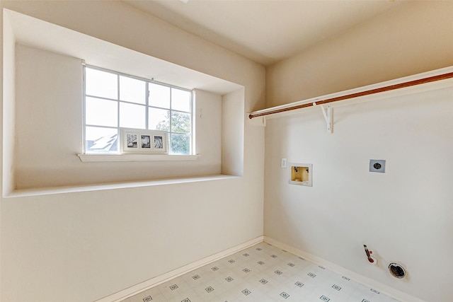 washroom featuring laundry area, hookup for a gas dryer, hookup for a washing machine, light floors, and electric dryer hookup