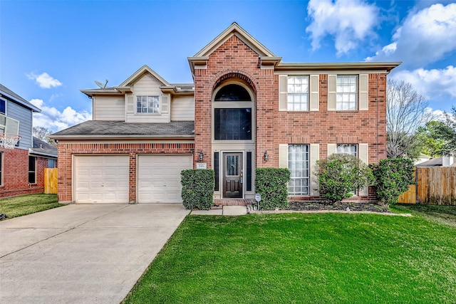 traditional home with driveway, brick siding, and a front lawn