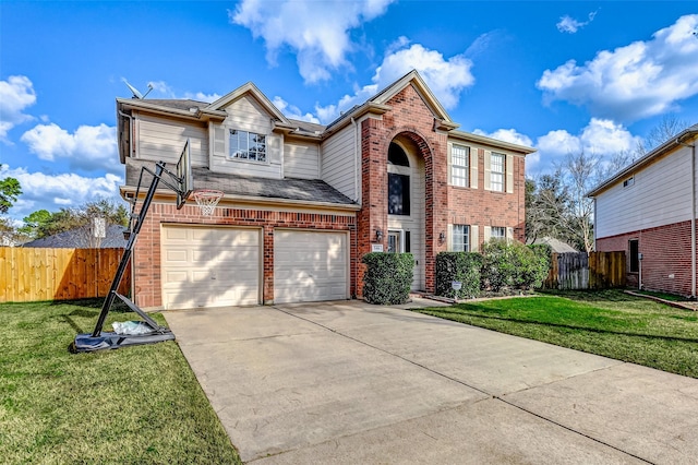 traditional home featuring driveway, a front yard, fence, and brick siding