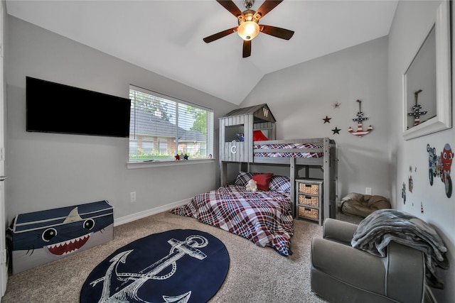 carpeted bedroom featuring vaulted ceiling and ceiling fan