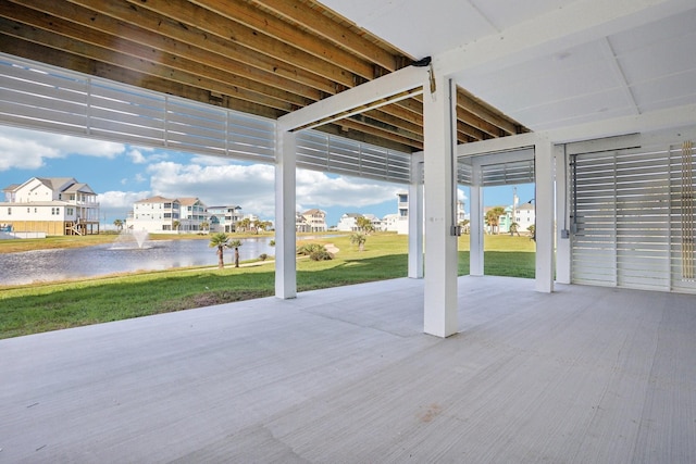 view of patio / terrace featuring a water view