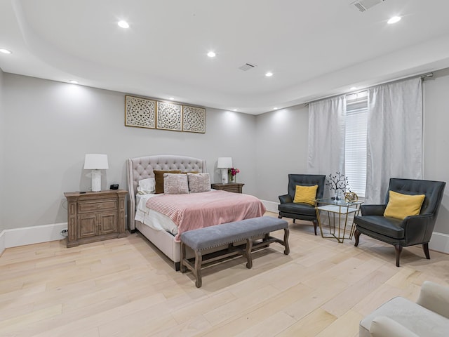 bedroom featuring light hardwood / wood-style floors