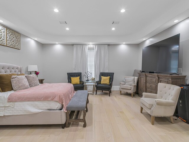 bedroom with light wood-type flooring