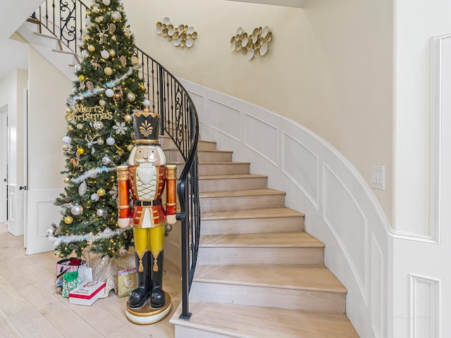 staircase featuring hardwood / wood-style floors