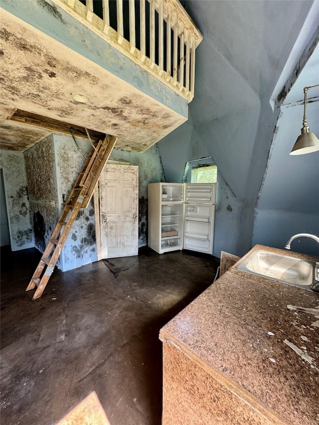 362 Ole Long Pull Rd, Livingston, TX 77351 - unfurnished bedroom with a sink, finished concrete flooring, and wine cooler