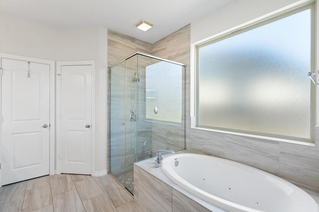 bathroom with plus walk in shower