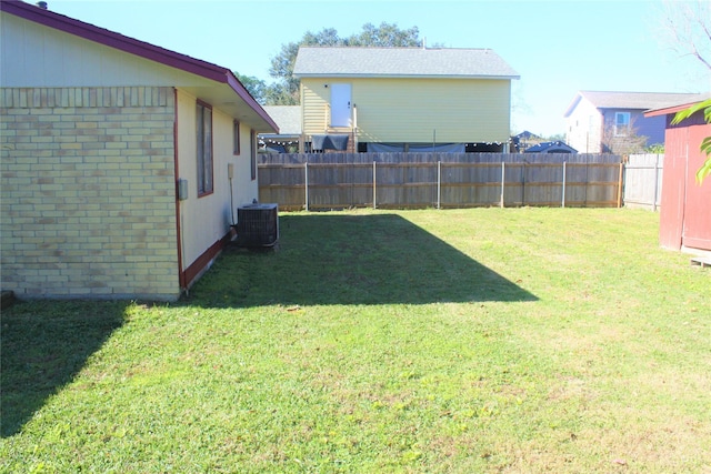 view of yard with central air condition unit