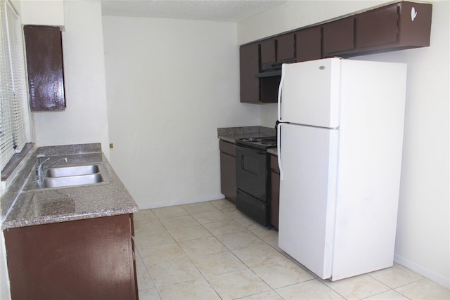 kitchen featuring dark brown cabinets, electric range, white fridge, and sink