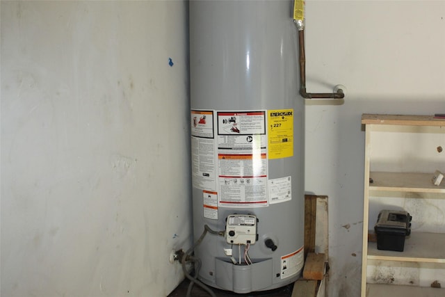 utility room with water heater