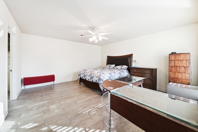 bedroom featuring light wood-type flooring and ceiling fan