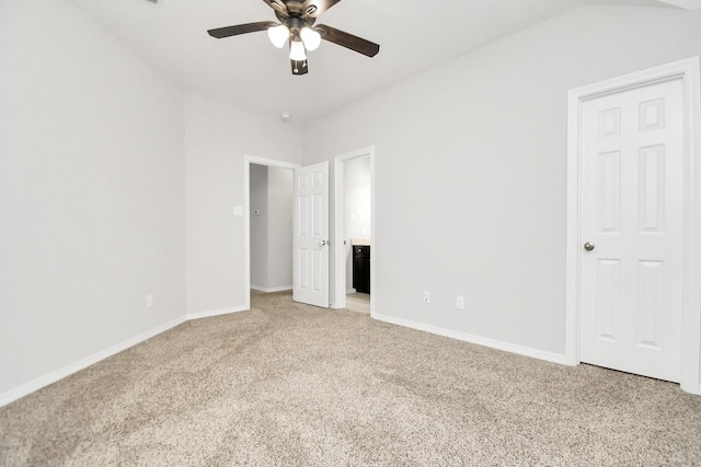 unfurnished bedroom featuring ceiling fan and carpet floors