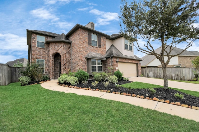 view of front of property with a front lawn and a garage