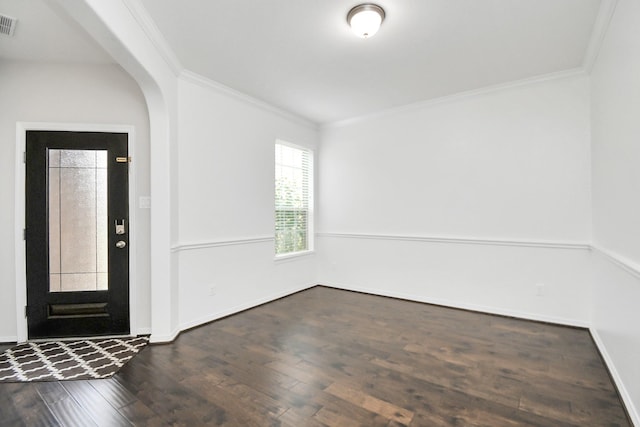 foyer with crown molding and dark hardwood / wood-style floors