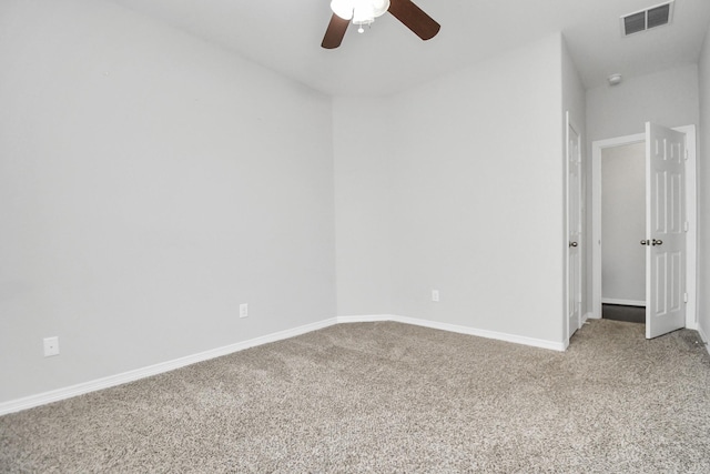 unfurnished room with carpet and ceiling fan