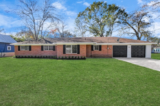 ranch-style house with a garage and a front lawn