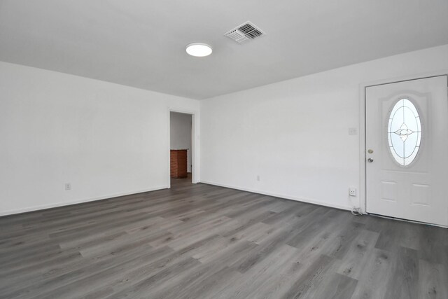 foyer with dark wood-type flooring