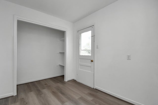 interior space with hardwood / wood-style flooring