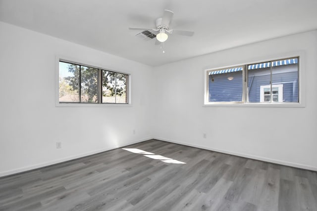 unfurnished room featuring ceiling fan and wood-type flooring